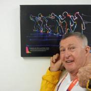 Students artwork admired by athletes in Olympic Village