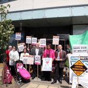 Protestors outside the CCG meeting