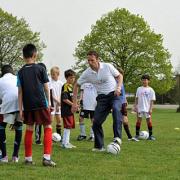 Silky skills: Gareth Southgate shows off his moves with a football