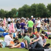 Crowds gather in Wimbledon Park hoping to get their hands on tickets.