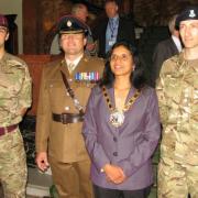 Manju Shahul-Hameed, mayor of Croydon, with members of the armed forces