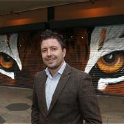 Kevin Zuchowski-Morrison is opening his gallery in St George's Walk, Croydon. The tiger eyes were painted by artist Jnasher