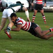 Tough day: Kiba Richards repels an Ealing attack                           All pictures: David Whittam