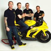 Good start: Simon Low, second from left, with his Crank Racing team