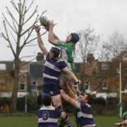 Reaching new heights: Duncan Madden gets up highest to claim a Battersea Ironsides line-out during the weekend win over Old Tiffinians  		              SP94644