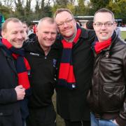 Cheers, lads: Hampton boss Alan Dowson, second from left, celebrates with fans on the Beveree pitch