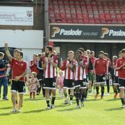 Lap of honour: Brentford players thank the fans for their support at Griffin Park this season