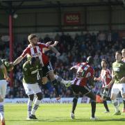 Not happy: Skipper Harlee Dean has not been overly impressed with Brentford's start to the campaign
