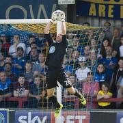 Safe hands: Ryan Clarke is disappointed with AFC Wimbledon's early results