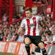 High hopes: Brentford's Lewis Macleod picked up a knock to his knee at Rotherham on Saturday
