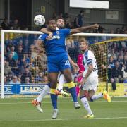 In the action: Tyrone Barnett gets stuck in against Chesterfield