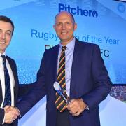 Speech: Richmond president John Heaton collects the club's award at Twickenham last week