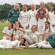 Fruits of their labour: Double county champions celebrate at North London Cricket Club last week