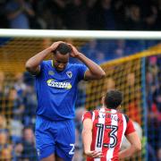 Sinking feeling: Tyrone Barnett rues a missed opportunity in the defeat to Sheffield United on Saturday