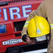 Firefighters tackle house fire at detached home in Cheam
