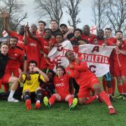 Carshalton Athletic celebrate gaining promotion after their thrilling 4-3 victory over Whyteleafe on Saturday. Picture: Ian Gerrard