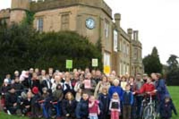 Protesting against the plans: local residents outside Nonsuch Mansion