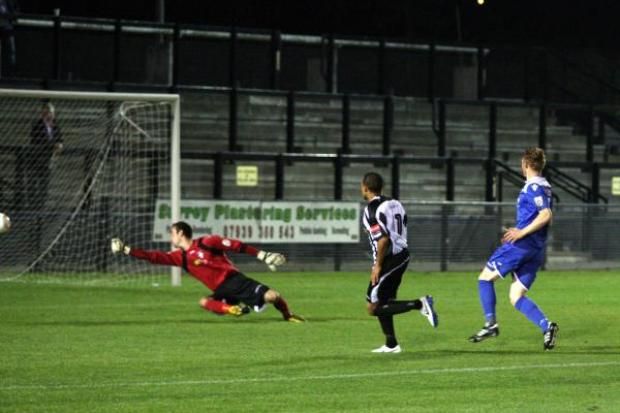 Up and running: Howard Newton equalises for Tooting & Mitcham United in Tuesday night's 3-1 FA Cup win over Bishop's Stortford                SP87826