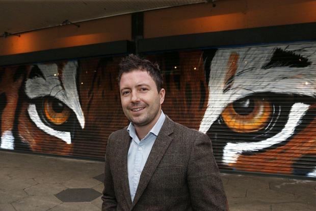 Kevin Zuchowski-Morrison is opening his gallery in St George's Walk, Croydon. The tiger eyes were painted by artist Jnasher