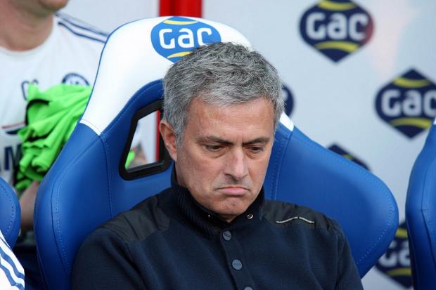 Cheer up: Chelsea boss Jose Mourinho has looked downbeat despite a first win of the season.