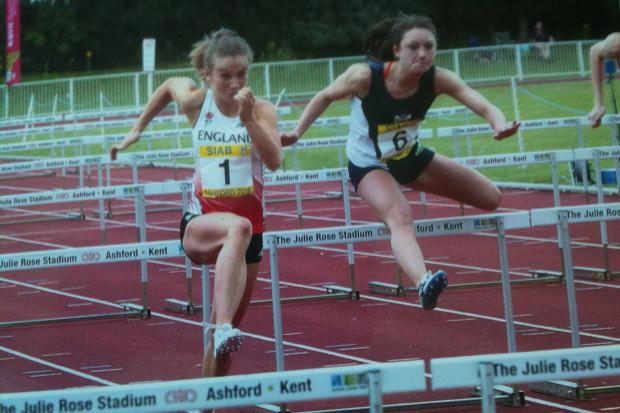 Leading the Earley charge: Kingston's Pippa Earley, left, leads the way in the U17 women's 80m hurdles at the SIAB Schools' International championship in Ashford at the weekend
