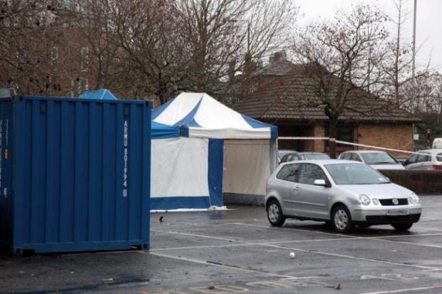 A forensic tent in Sibthorpe Road car park where Mr Croos fell