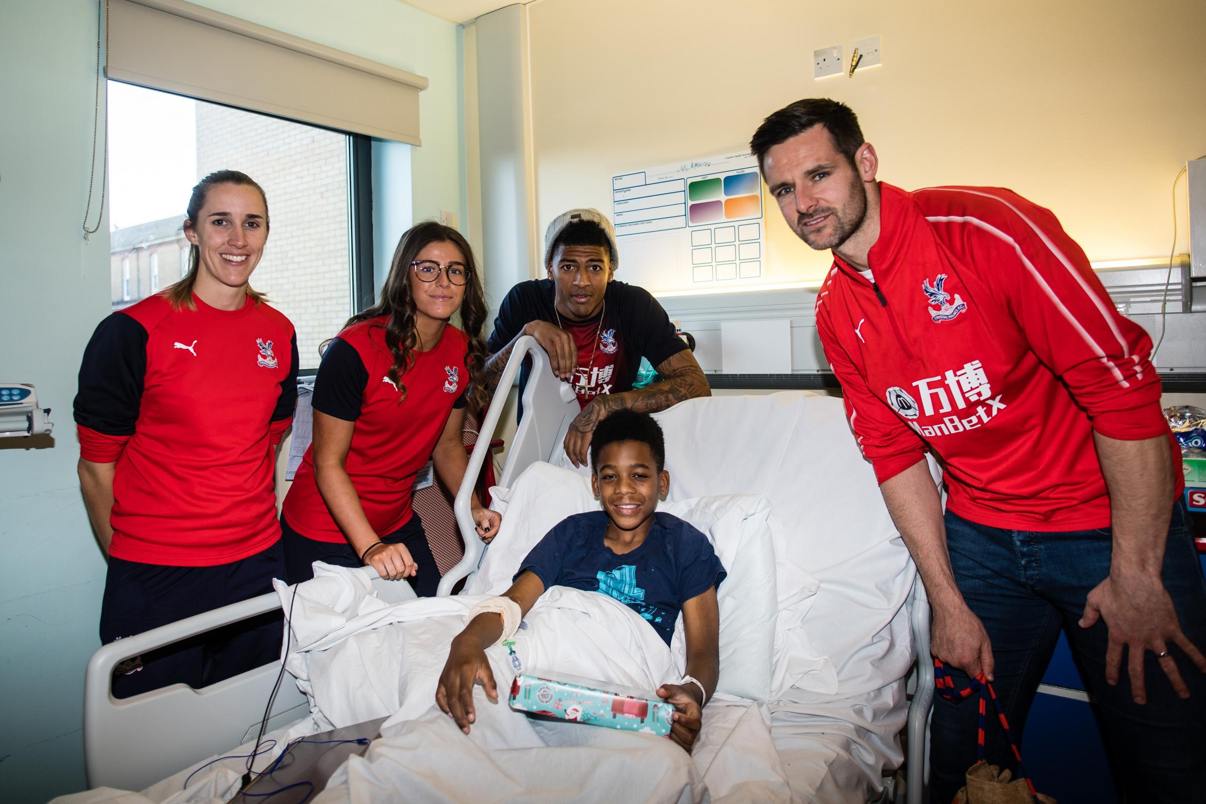 Crystal Palace players bring festive cheer to Croydon hospital