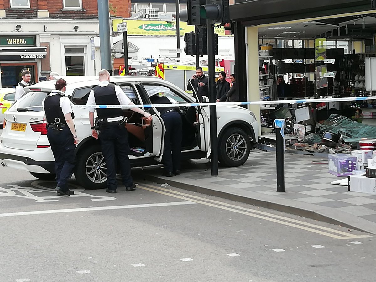 Car ploughs into Croydon shop after woman has 'medical episode'